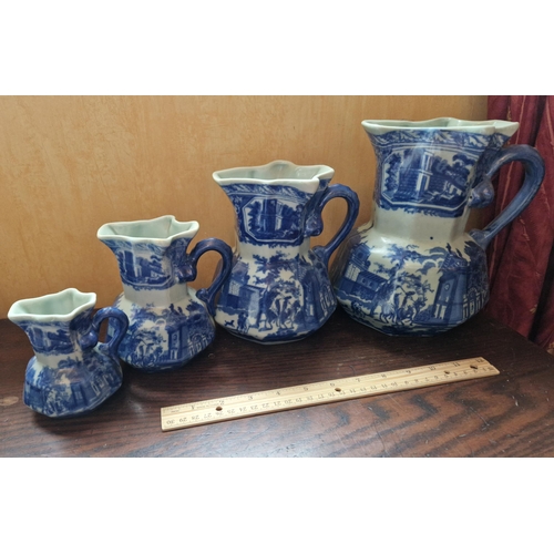 116 - Set of Four Graduated Blue & White Ironstone Jugs, Tallest Measures 21cm in Height