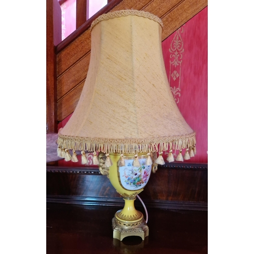 141 - Porcelain Table Lamp and Shade with Gilt Ram's Heads. H58 x D:36cm overall