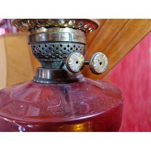 144 - Antique Ruby Glass Oil Lamp with Funnell and Shade, Height 74cm