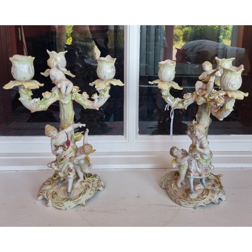 66 - Pair of Depose Austrian Porcelain Three-Branch Candelabras, Height 25cm