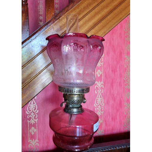 144 - Antique Ruby Glass Oil Lamp with Funnell and Shade, Height 74cm