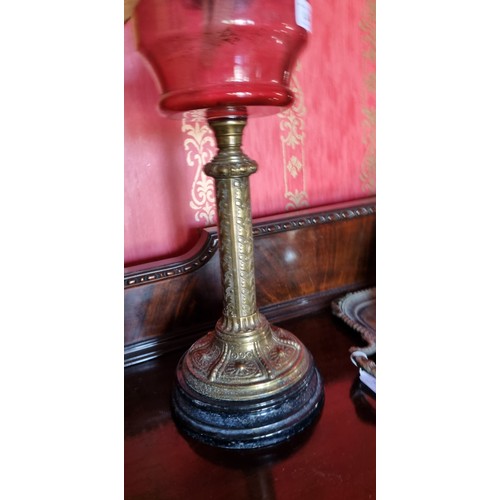 144 - Antique Ruby Glass Oil Lamp with Funnell and Shade, Height 74cm