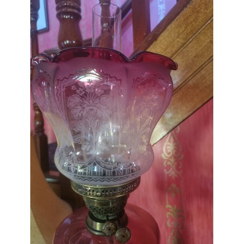 144 - Antique Ruby Glass Oil Lamp with Funnell and Shade, Height 74cm