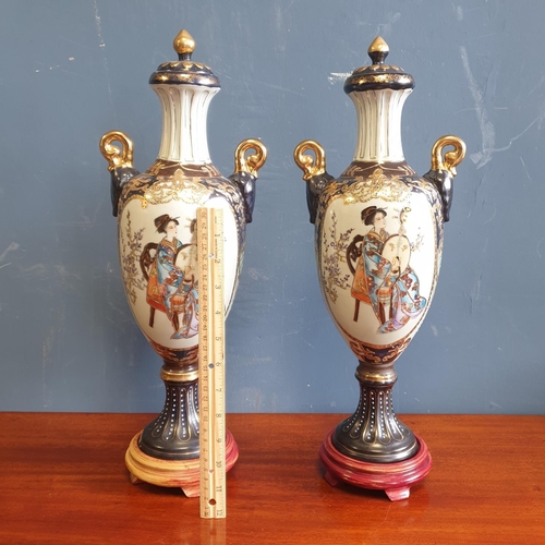 72 - Pair of Satsuma Oriental Urns on Wooden Stands, Height 48cm