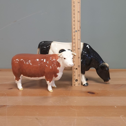 93 - Two Porcelain Cow Ornaments by Beswick and Other, Heights 10/12cm