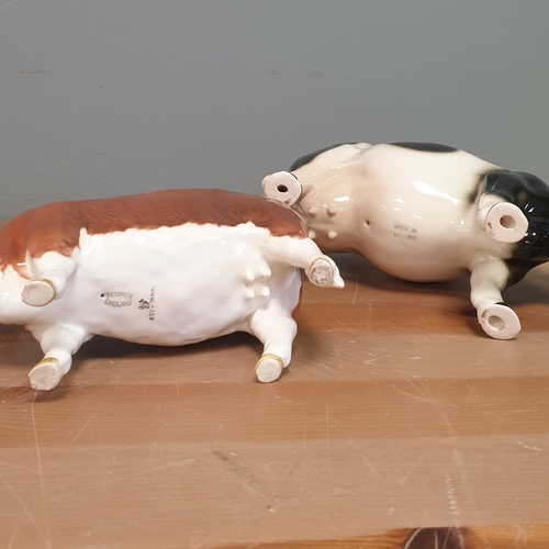 93 - Two Porcelain Cow Ornaments by Beswick and Other, Heights 10/12cm