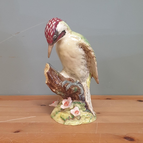 109 - Tall Beswick Porcelain Woodpecker Ornament, Height 23cm