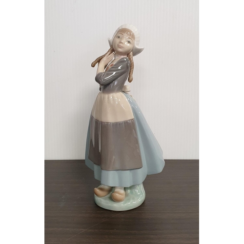 27 - Lladro Porcelain Figure - Dutch Girl. Height 25cm