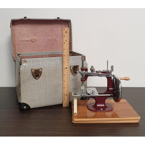 78 - Miniature Sewing Machine in Case