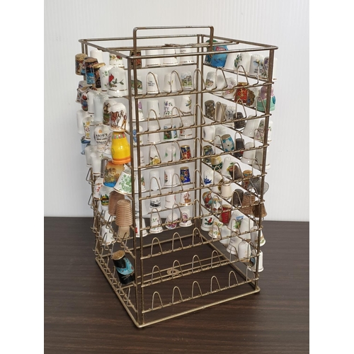 133 - Collection of Thimbles on Wire Display Stand