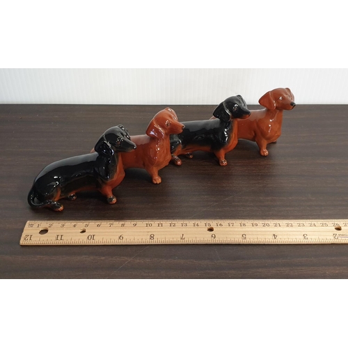 136 - Four Beswick Porcelain Dachshund Figures,