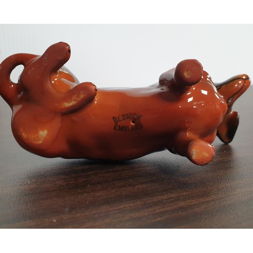 136 - Four Beswick Porcelain Dachshund Figures,