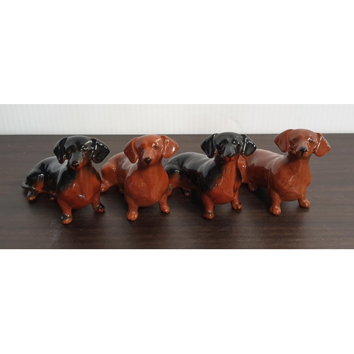 136 - Four Beswick Porcelain Dachshund Figures,