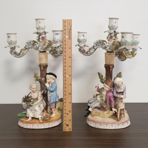 200 - Pair of Figurative Porcelain Three Branch Candelabras