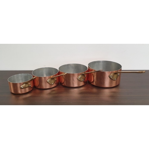 205 - Four Nesting Copper Saucepans with Brass Handles