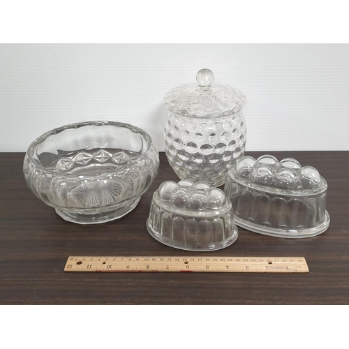 288 - Four Pieces of Glass  - Two Jelly Moulds, Biscuit Barrell and Fruit Bowl