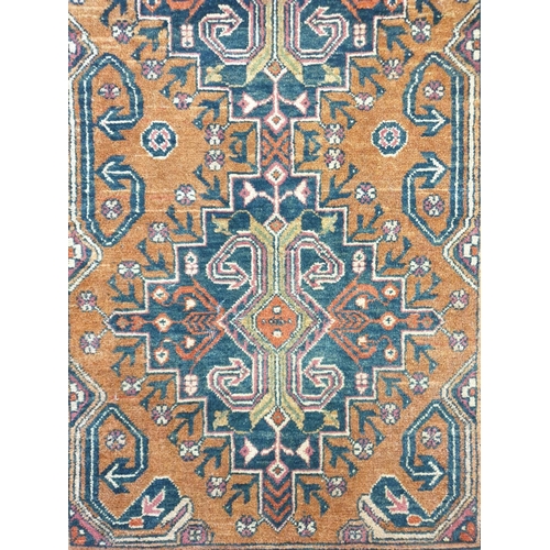 406 - Persian Style Orange Ground Rug, L:160 x W:100 approx.