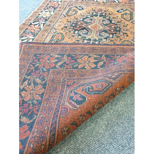 406 - Persian Style Orange Ground Rug, L:160 x W:100 approx.