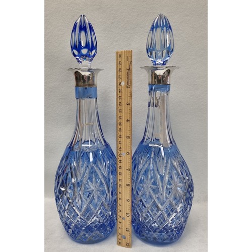 567 - Pair of Heavy Blue Cut Crystal Silver Top Decanters