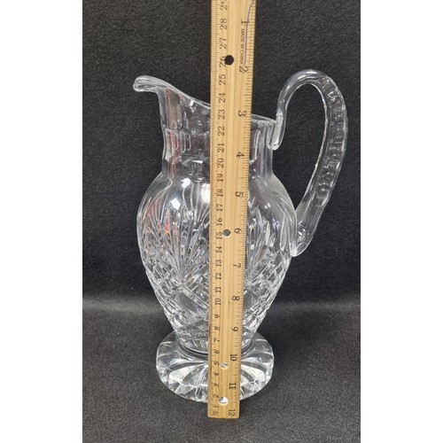 556 - Large Waterford Crystal Jug, approx. 25cm high