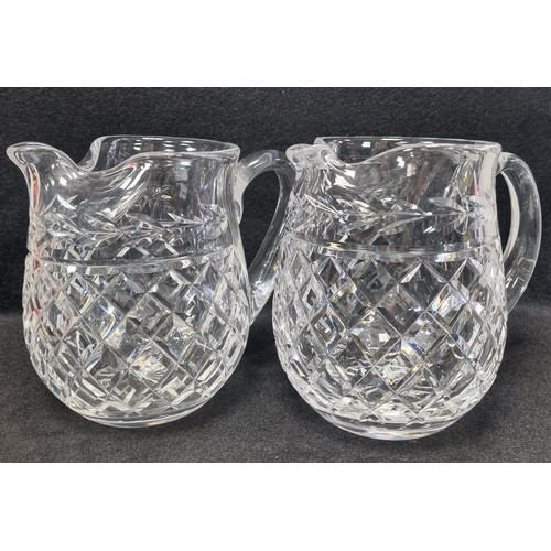 552 - Pair of Waterford Crystal Water Jugs, approx. 15cm high