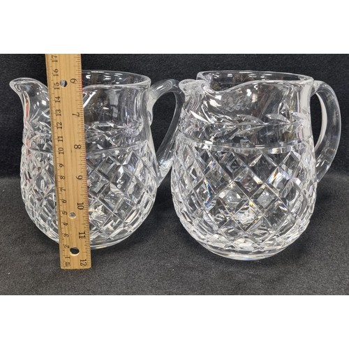 552 - Pair of Waterford Crystal Water Jugs, approx. 15cm high