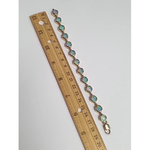 671 - 9ct Heavy Opalesque Bracelet