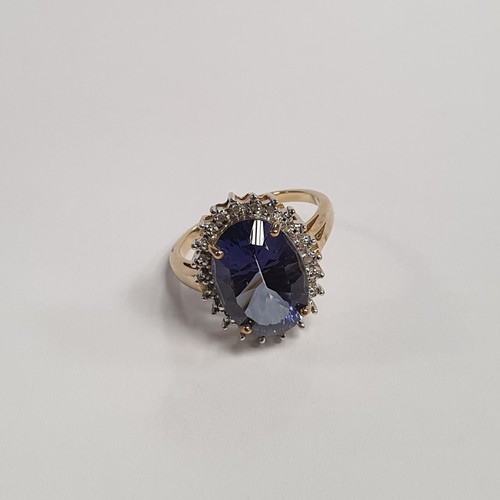 678 - 9ct Diamond and Sapphire Cluster Ring