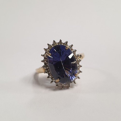 678 - 9ct Diamond and Sapphire Cluster Ring