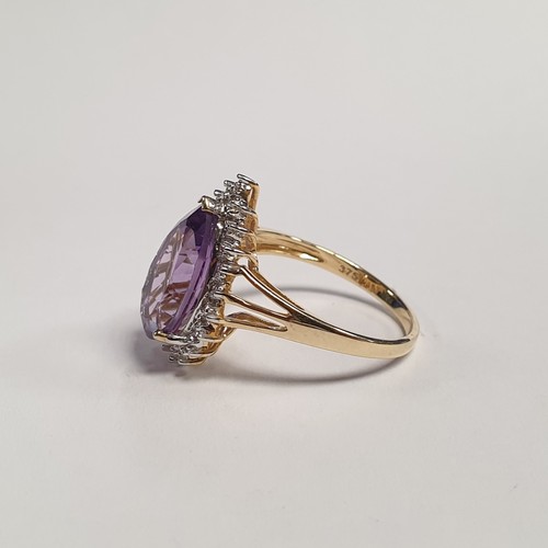 684 - 9ct Amethyst and Diamond Cluster Ring