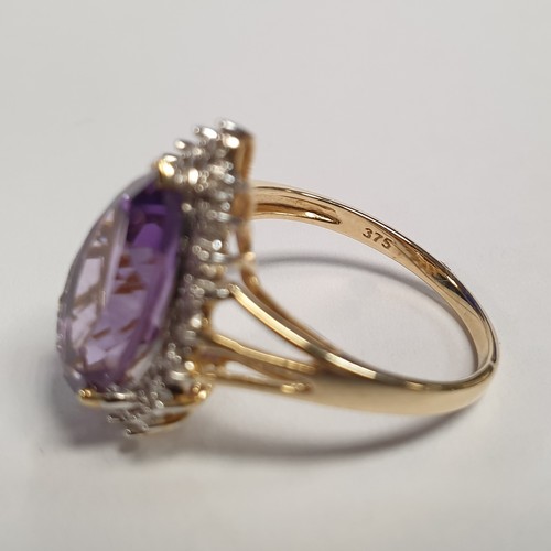 684 - 9ct Amethyst and Diamond Cluster Ring