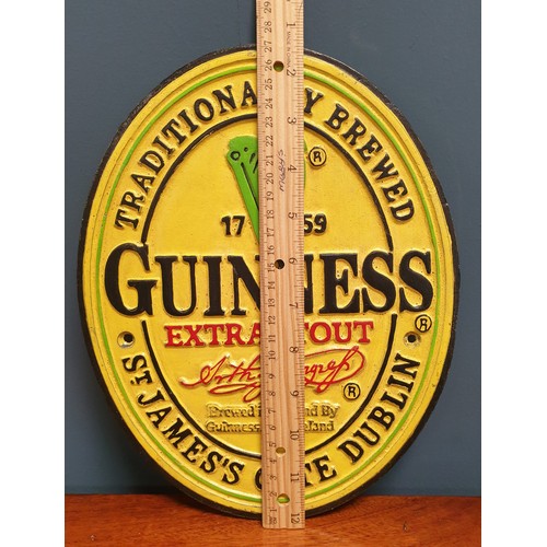 791 - Cast Iron Guinness Label Sign and 3x Guinness Ornaments