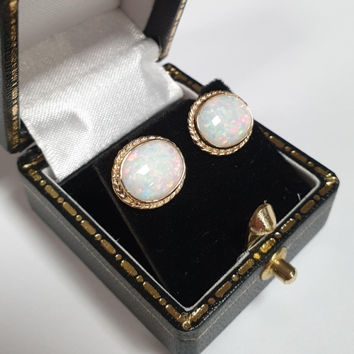 320 - Pair of Gold Opal Stud Earrings