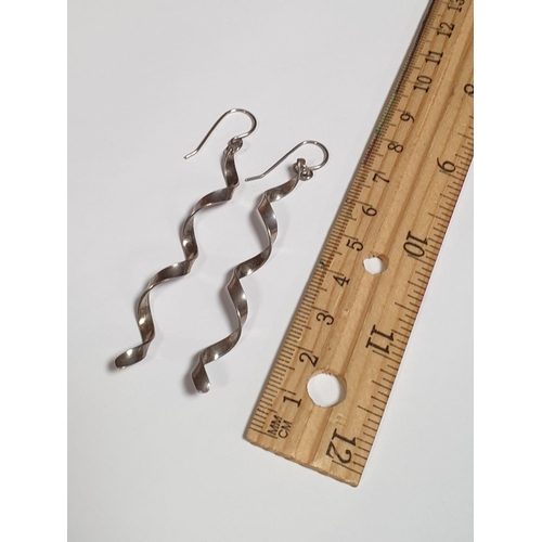 321 - Pair of Long Silver Spiral Earrings