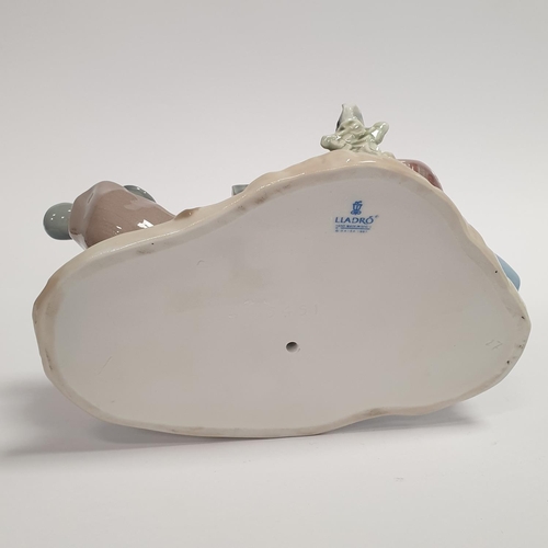 7 - Lladro Porcelain Figure, Boy Reading a book with a dog approx. 9cm high x 20cm long