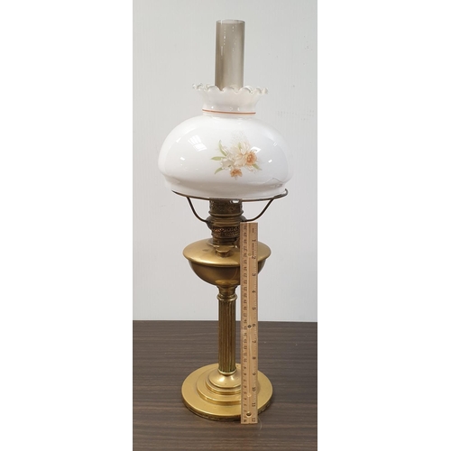 173 - Brass Oil Lamp with White & Floral Glass Shade complete with funnel , Height 60cm