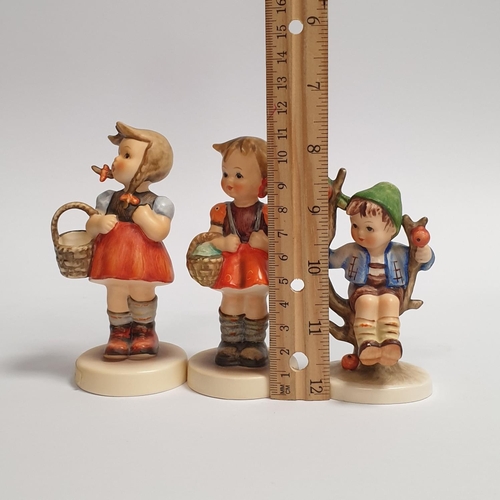 298 - Lot of 3x Hummel Figurines - Little Shopper, School Girl and Apple Tree Boy.  Tallest 12cm