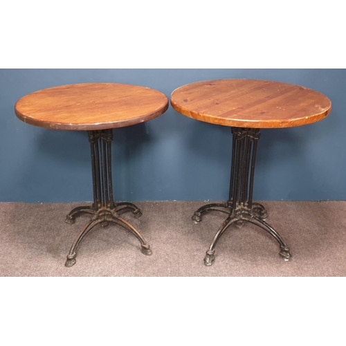 399 - Pair of Circular Pub Tables on Cast Iron Bases, 73x68cm / 75x70cm