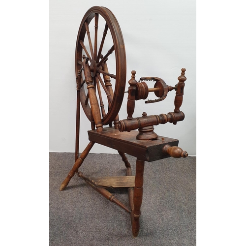 557 - Antique Spinning Wheel, H:97 x L:105cm