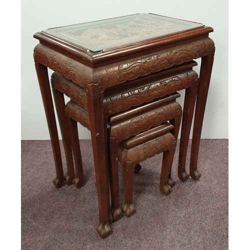 179 - Oriental Carved Nest of Four Glass Top Tables, H:67 x W:52 x D:37cm