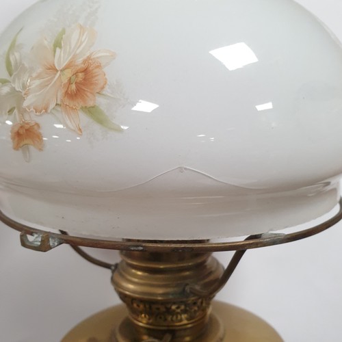 173 - Brass Oil Lamp with White & Floral Glass Shade complete with funnel , Height 60cm