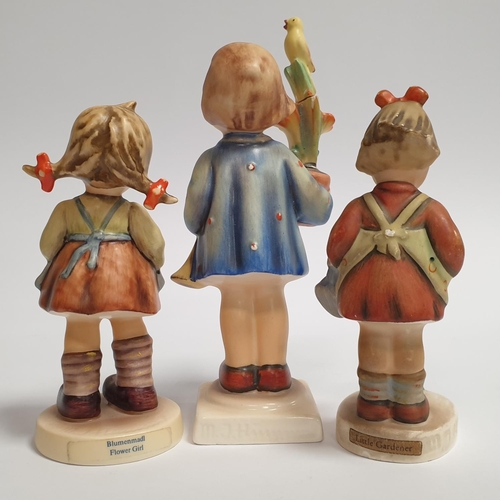 587 - Lot of 3x Hummel Figurines, Little Gardener, Flower Girl and other with repair to flower. Tallest 15... 