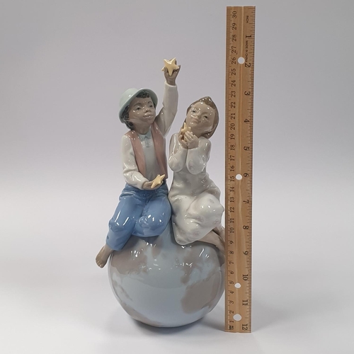 606 - Lladro Unicef Porcelain Figure with Box, Height 26cm