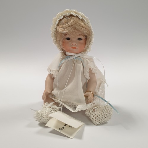 602 - Porcelain Doll Reproduction of S.F.B.J 252 Pouty in Original Box H: approx.. 20cm   (legs, arms and ... 