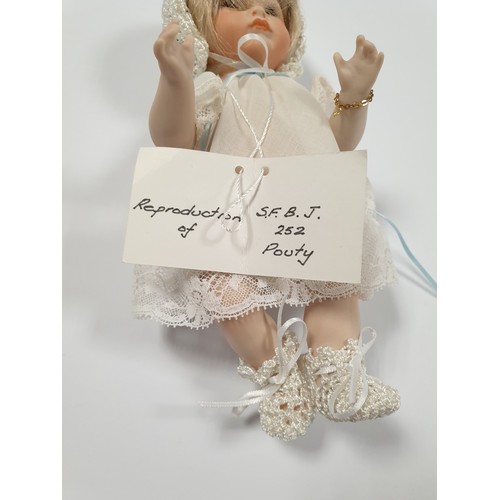 602 - Porcelain Doll Reproduction of S.F.B.J 252 Pouty in Original Box H: approx.. 20cm   (legs, arms and ... 