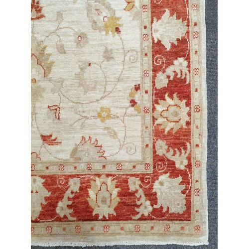 724 - Red and Cream Wool Floor Rug 198cm x 123cm