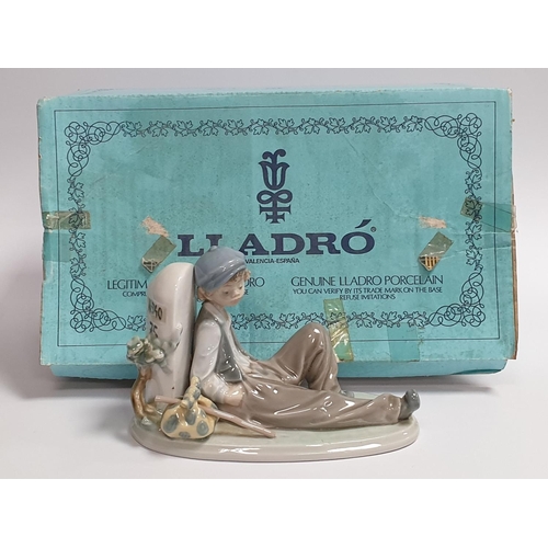 798 - Lladro Porcelain Figure with Box Boy Seated against wall approx. L: 18cm x h:11.5cm