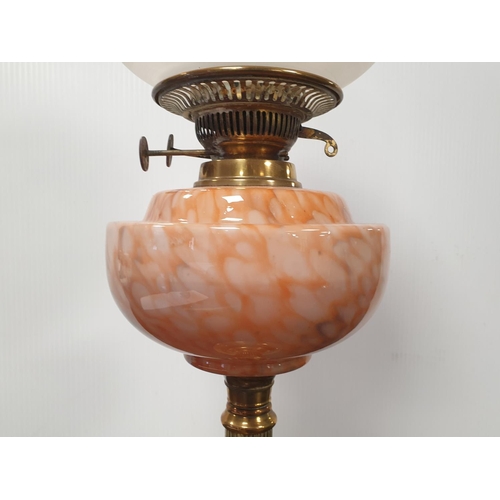 106 - Oil lamp with coloured glass reservoir, height 62cm
