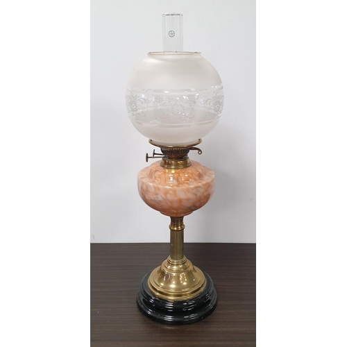 106 - Oil lamp with coloured glass reservoir, height 62cm