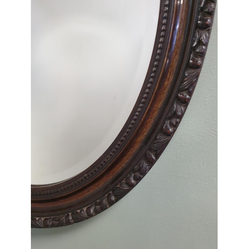 231 - Mahogany Framed Bevelled Oval Wall Mirror, H:59 x W:49cm